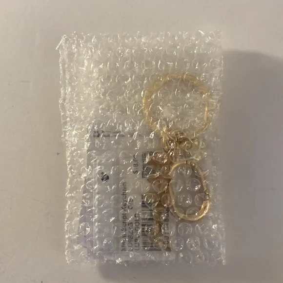 Lululemon keychain/ bag charm, red and gold tone - Picture 3 of 3